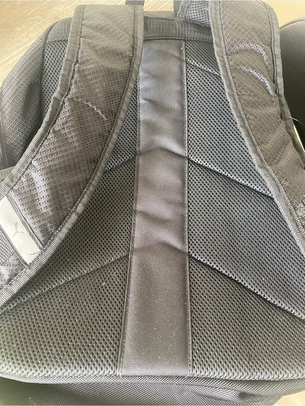 Puma Black Backpack with Metallic Copper Logo